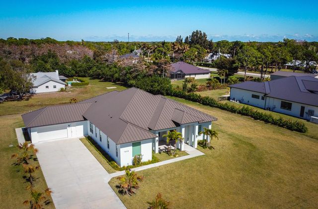 7595 155th Place N, Palm Beach Gardens, FL 33418