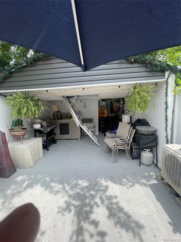 97-47 91st Street, Ozone Park, NY 11416