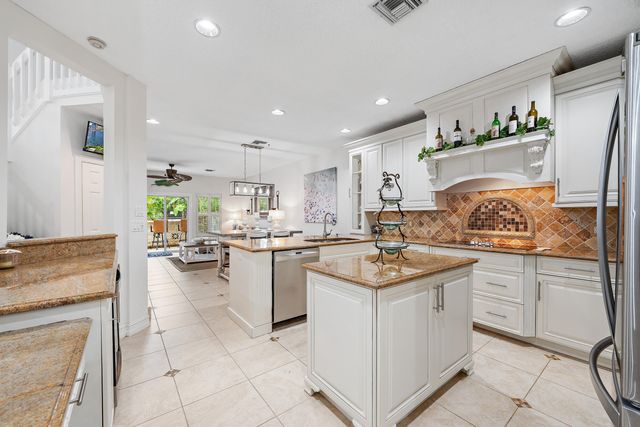 27 Grand Bay Circle, Juno Beach, FL 33408