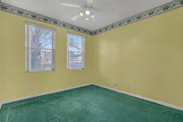 180 Caribe Court, Greenacres, FL 33413