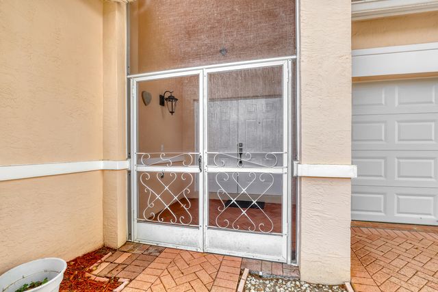 180 Caribe Court, Greenacres, FL 33413