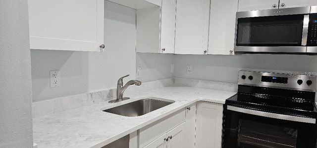 704 HAMMOCK PINE BOULEVARD 704, Clearwater, FL 33761