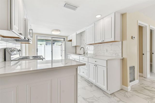 223 148TH AVENUE E, Madeira Beach, FL 33708