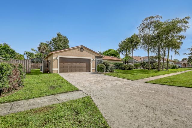 102 SAND PINE Way, Royal Palm Beach, FL 33411