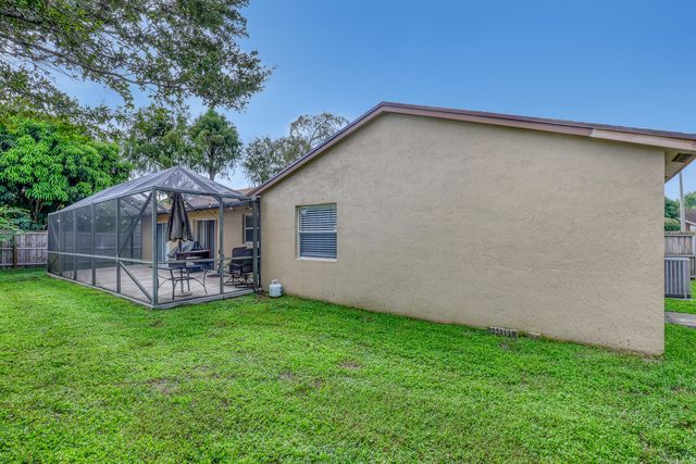 102 SAND PINE Way, Royal Palm Beach, FL 33411