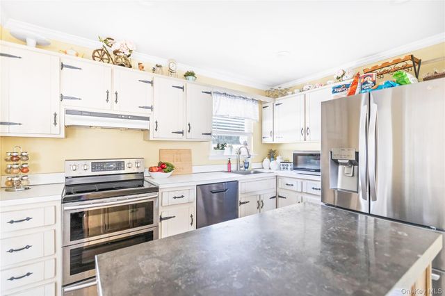 9 Golf Course Road, Bellport, NY 11713