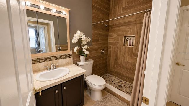 8703 FORT SHEA AVENUE, Orlando, FL 32822
