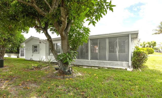 7102 NW 71st St, Tamarac, FL 33321