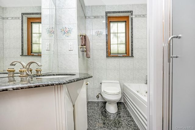 64-39 83rd Street, Middle Village, NY 11379