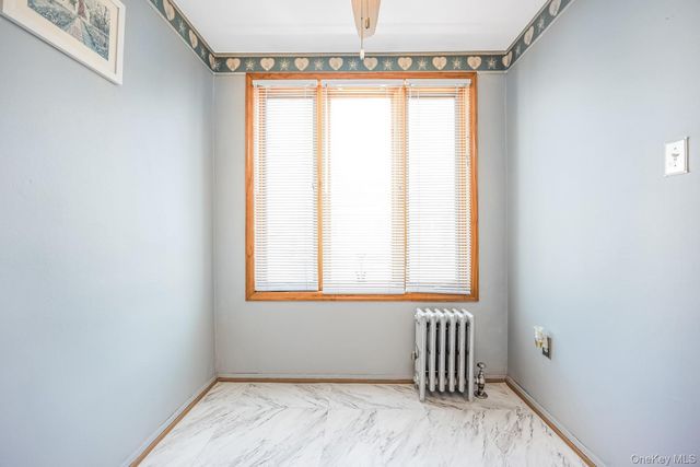 64-39 83rd Street, Middle Village, NY 11379