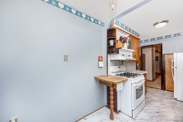 64-39 83rd Street, Middle Village, NY 11379