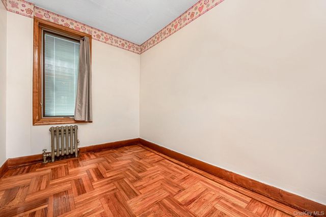 64-39 83rd Street, Middle Village, NY 11379