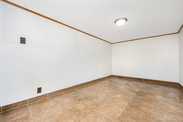 64-39 83rd Street, Middle Village, NY 11379