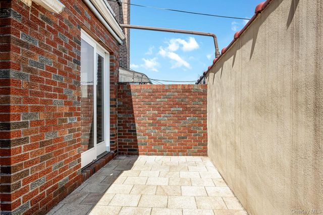 64-39 83rd Street, Middle Village, NY 11379