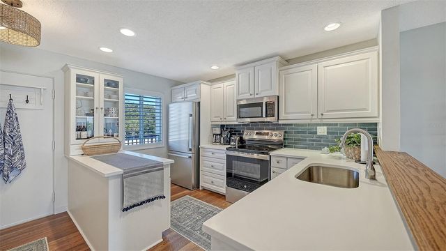 8977 MIDNIGHT PASS ROAD 222, Sarasota, FL 34242