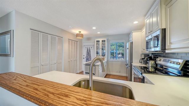 8977 MIDNIGHT PASS ROAD 222, Sarasota, FL 34242