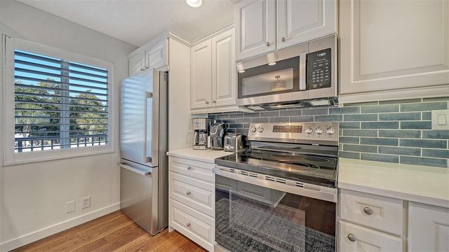 8977 MIDNIGHT PASS ROAD 222, Sarasota, FL 34242