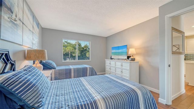 8977 MIDNIGHT PASS ROAD 222, Sarasota, FL 34242