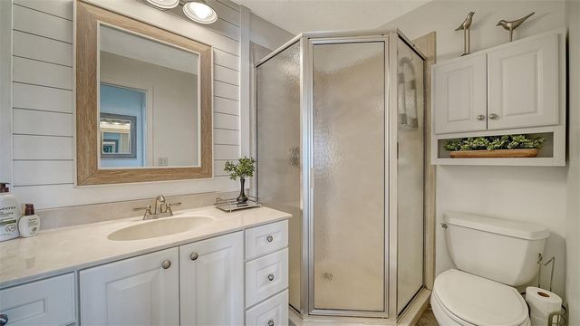 8977 MIDNIGHT PASS ROAD 222, Sarasota, FL 34242