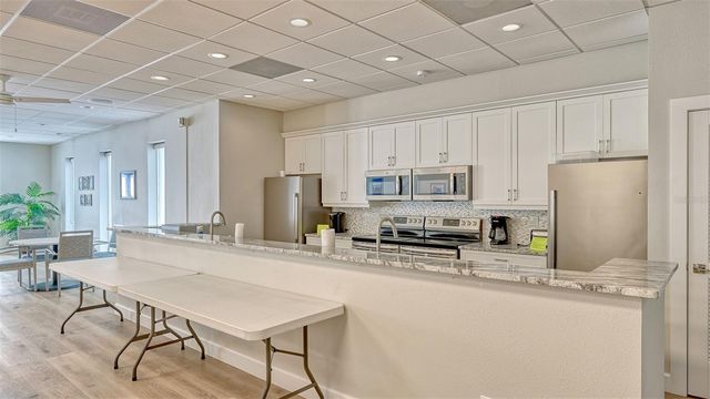 8977 MIDNIGHT PASS ROAD 222, Sarasota, FL 34242
