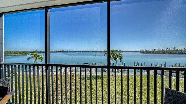 8977 MIDNIGHT PASS ROAD 222, Sarasota, FL 34242