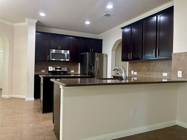 909 Coulee DR, Leander, TX 78641