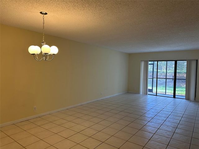 310 Racquet Club Road 103, Weston, FL 33326