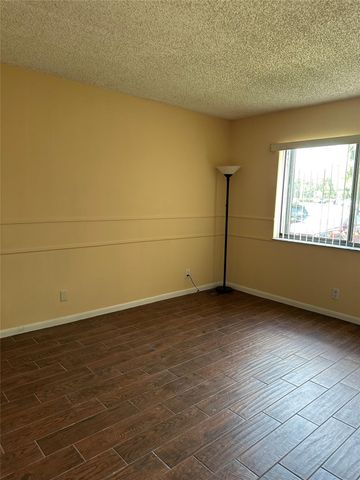 310 Racquet Club Road 103, Weston, FL 33326
