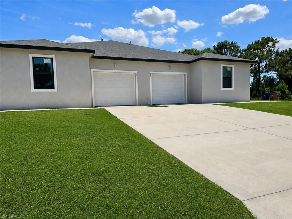 23/25 W 12th ST, LEHIGH ACRES, FL 33972 — exterior
