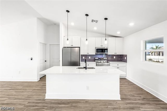 1702 NW 5th PL, Cape Coral, FL 33993