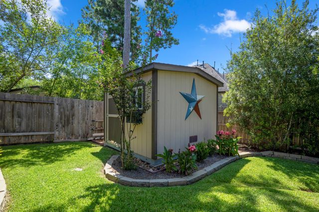 219 Chirping Squirrel Court, Pinehurst, TX 77362