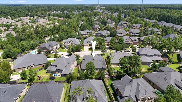 219 Chirping Squirrel Court, Pinehurst, TX 77362