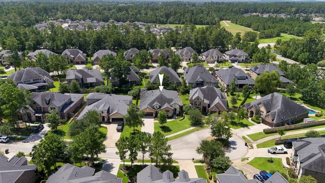 219 Chirping Squirrel Court, Pinehurst, TX 77362