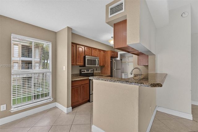 995 Riverside Drive 120, Coral Springs, FL 33071