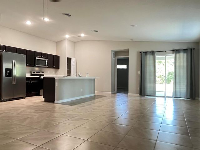 1133 SW Ingrassina Avenue, Port St Lucie, FL 34953