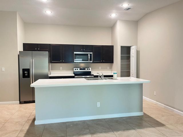 1133 SW Ingrassina Avenue, Port St Lucie, FL 34953