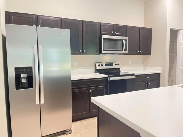 1133 SW Ingrassina Avenue, Port St Lucie, FL 34953