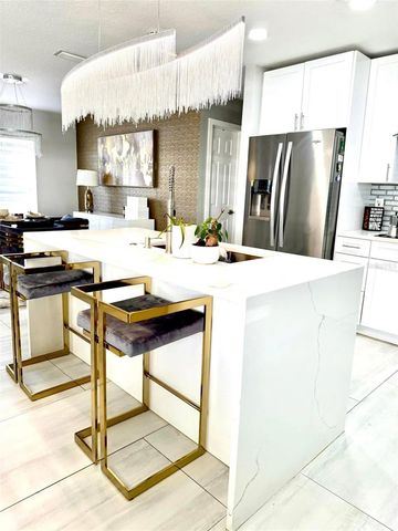 8503 WOODBRIDGE BOULEVARD, Tampa, FL 33615