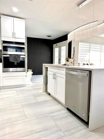 8503 WOODBRIDGE BOULEVARD, Tampa, FL 33615