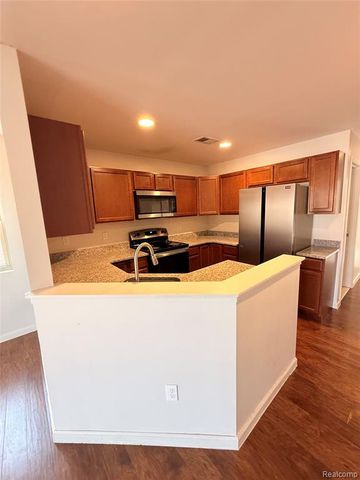 406 Legato Drive, Walled Lake, MI 48390