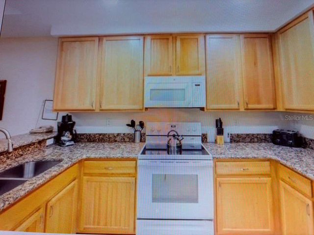 3050 PIRATES RETREAT COURT 103, Kissimmee, FL 34747