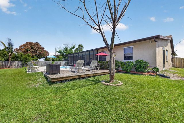 437 SE Nome Drive, Port St. Lucie, FL 34984