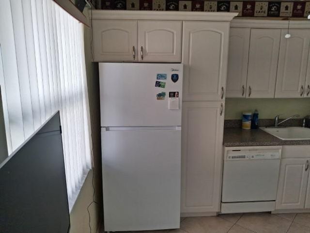 32 Colonial Club Drive 201, Boynton Beach, FL 33435