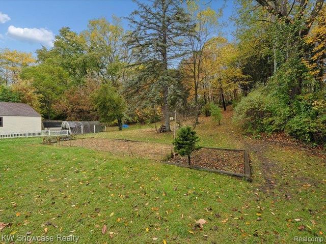 612 Sunrise Park Street, Genoa Township, MI 48843