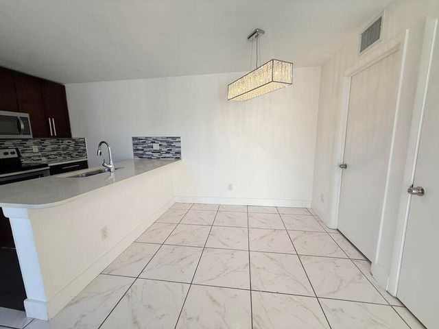 8365 Boca Rio Drive, Boca Raton, FL 33433