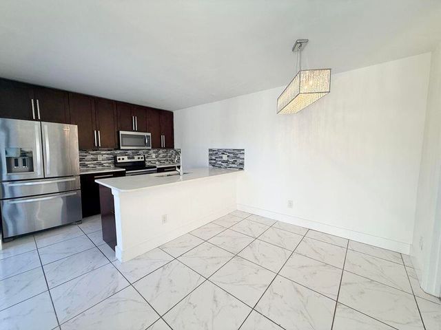 8365 Boca Rio Drive, Boca Raton, FL 33433