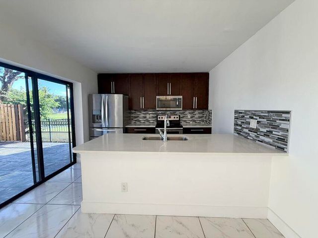 8365 Boca Rio Drive, Boca Raton, FL 33433