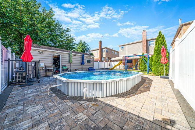 2239 99th Street, East Elmhurst, NY 11369