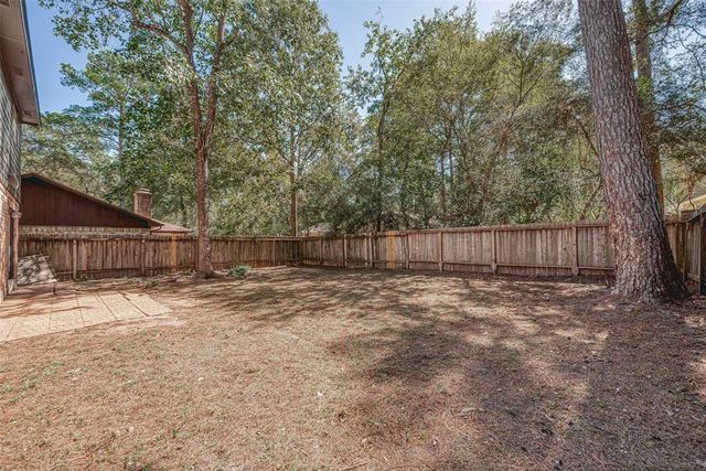 6 N Waxberry Road, The Woodlands, TX 77381