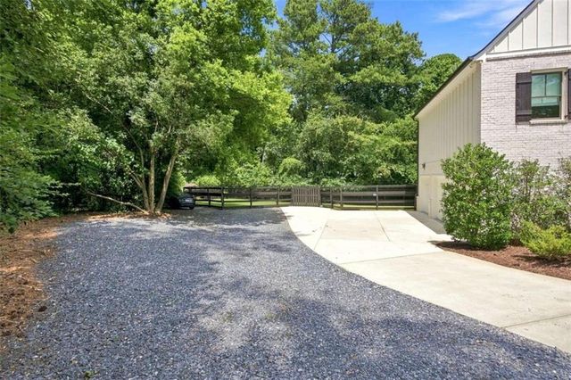 96 Woodstock Road, Roswell, GA 30075